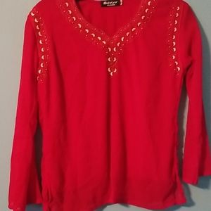 Red top worn 1 time has beads and embroidery fits like a small
